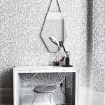 dressing table with white floral wallpaper