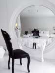 elegant white dressing table with black chair