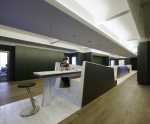 contemporary-office-interior-design-hallway-with-wood-flooring-dark-green-colored-walls-and-modern-lighting-system Jung-von-Matt-office