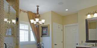 Designing Bathroom Lighting Fancy over the tub