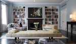 fireplace wood suround mantel built in bookshelves books shelves shelving
