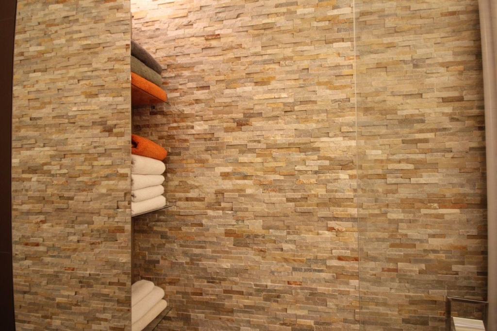 Ivory Natural Stone Cladding In Bathroom