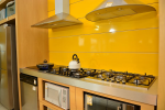 sunny yellow colored kitchen schemes